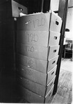 Stacked boxes with the number 120 written on the side