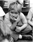 East Memorial Elementary School student sitting and listening by Dan Wooley