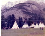 Tipis at Stoney encampment, Banff, Alberta, Canada by B. Bush