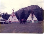 Tipis and people on horses, Banff, Alberta, Canada by B. Bush