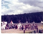 Tipis and people dressed in traditional Indian clothing, Banff,Alberta, Canada by B. Bush