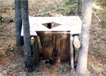 Toilet constructed by recreation users. Wyoming Creek Trailhead. by M. Miller
