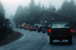 Members of the Tlingit Tribe form a caravan into Angoon, Alaska, November 1, 2003 by Kevin Moloney
