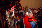 Thomas Davis, left, and Lydia George of the Tlingit Nation celebrate the return of the Bear Clan Totem, October 20, 2003 by Kevin Moloney